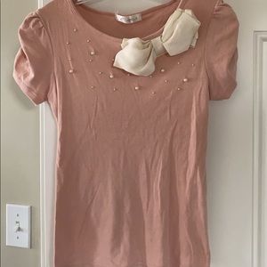Pink shirt with bow